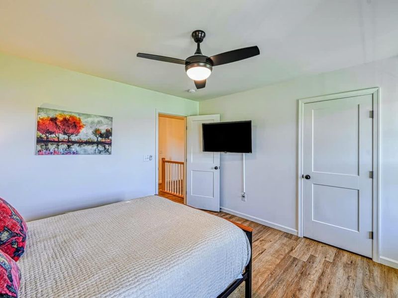 Bedroom #4 - Lake-house simple, with the natural light that makes everything feel slower.