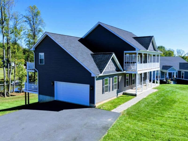 House at Day - The full property from the front.