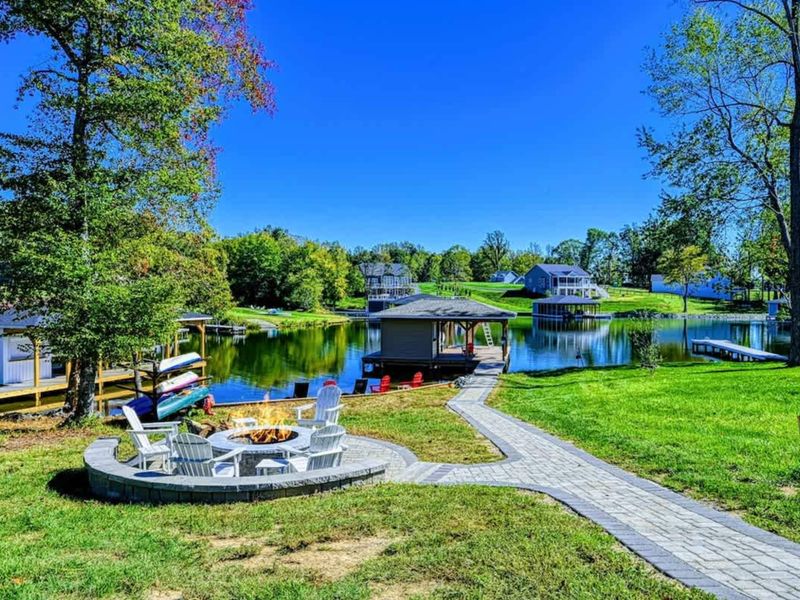 Fire Pit - Pulled-up Adirondack chairs, lake breeze, and the quiet of Lake Anna's private side.