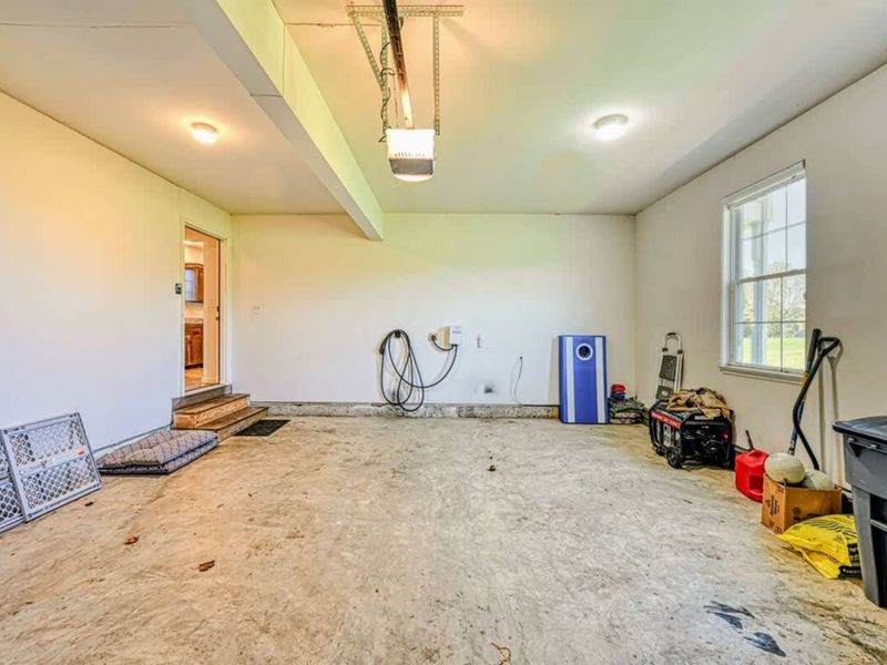 Garage - Two-car space with a Level 2 EV charger built in. Tesla-ready.