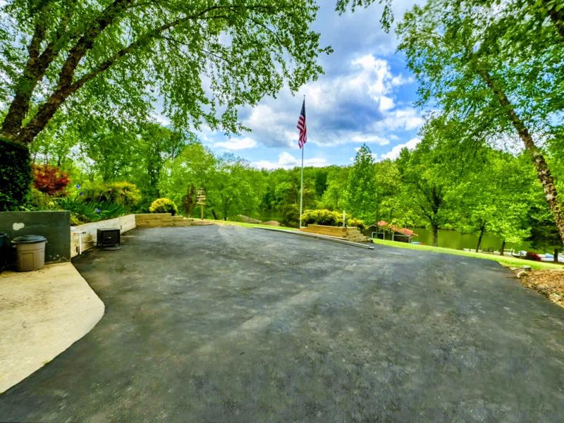 Take in the peaceful surroundings and greenery of this scenic driveway leading to your Lake Anna retreat.