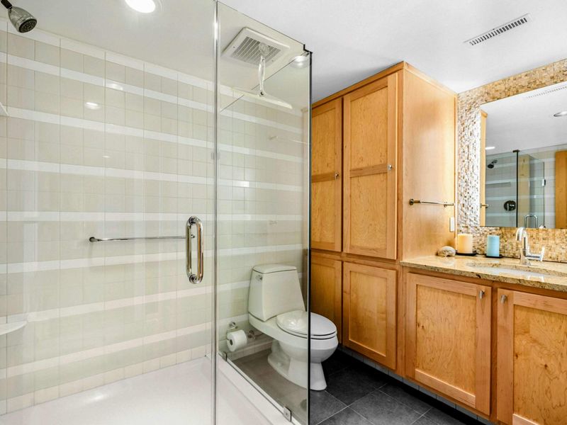 Relax and refresh in this modern bathroom, where sleek design and comfort meet after a day of Lake Anna adventures.