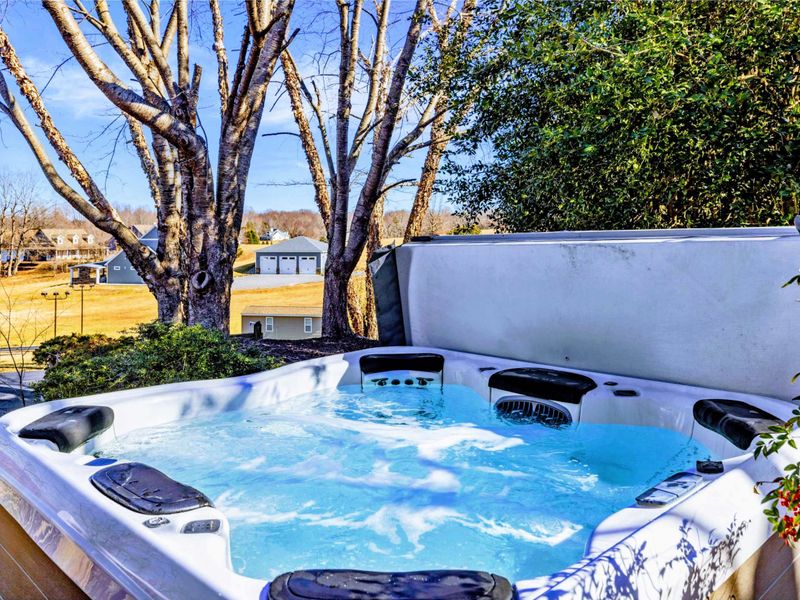 Relaxing Hot Tub with Lake Views - Soak in the private hot tub while enjoying peaceful Lake Anna views. Perfect for unwinding after a day on the water or stargazing in the evening. A true retreat for relaxation and rejuvenation.