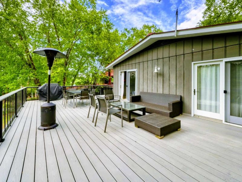Savor peaceful mornings or vibrant sunsets on this inviting deck with Lake Anna as your backdrop.