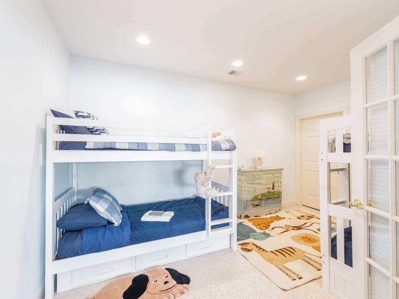 Fun, animal themed bunk room! These bunk beds are super cozy and so fun for kids. We have toddler gates to convert into a safe, toddler bed/prevent from rolling. Carpeted, comfortable and right near the playroom and bathroom.