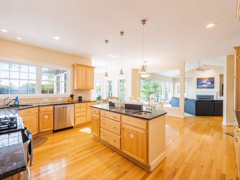 Huge, clean, stocked kitchen with everything you’ll need plus more! You can be cooking in the kitchen yet still be involved in the living room fun! Our kitchen features a large island, a gas stove and and 2 sinks.