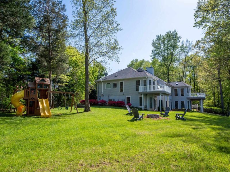 A view of the grassy area of our yard. Great for yard games, throwing a football, baseball, frisbee, corn hole. So many activities!!