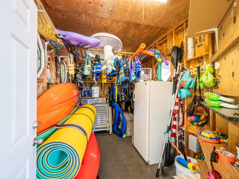 Stocked boat house with TONS of life jackets and toys that you may use to make it the best lake day ever!!