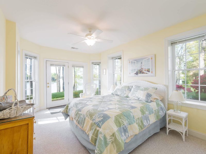 Private entrance to the backyard and lake. You can wake up and walk right outside in the sunshine to get your day started!