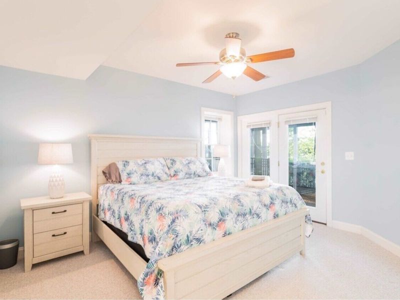 The bedroom suite in the basement with separate entrance to the backyard and a private bathroom. This room has an incredible lake view.