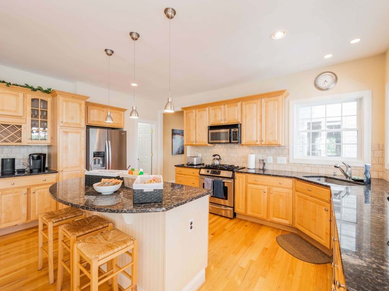 Ample counter space, gas stove, coffee bar, tons of cookware and dinnerware