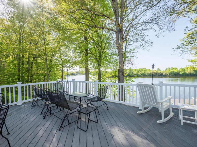 Huge patio with ample seating!! The perfect place to grill, chill and take in the lake life. Our home is very private and you feel like you have the lake to yourselves out here!