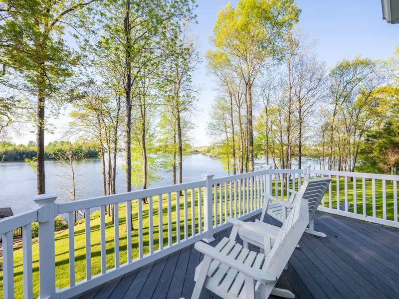 Your own private patio attached to the Primary Suite! Overlooks the lake as well as the kids playing on the playground to your right.