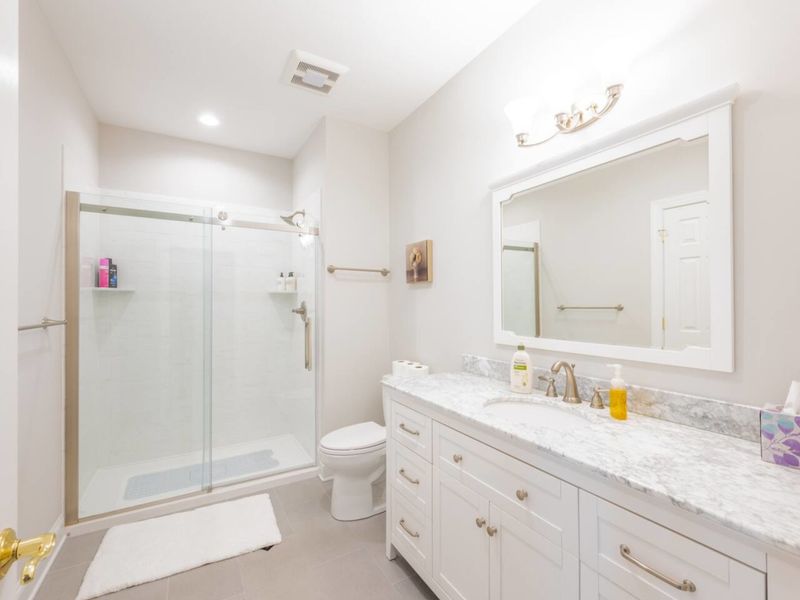 Brand new bathroom with stand up shower and lots of counter space