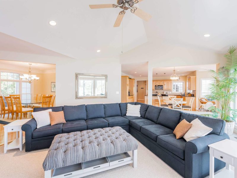 Our giant, comfortable sectional is the perfect spot for movie nights while overlooking the moonlit lake. Cozy blankets can be found in the closet by the stairs and lots of fun board games underneath the TV!