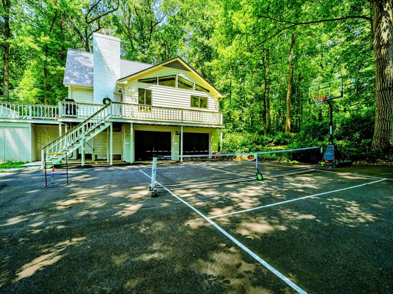 Basketball and Pickleball Court: A well-maintained outdoor court perfect for basketball and pickleball, ensuring fun for all ages near Lake Anna.