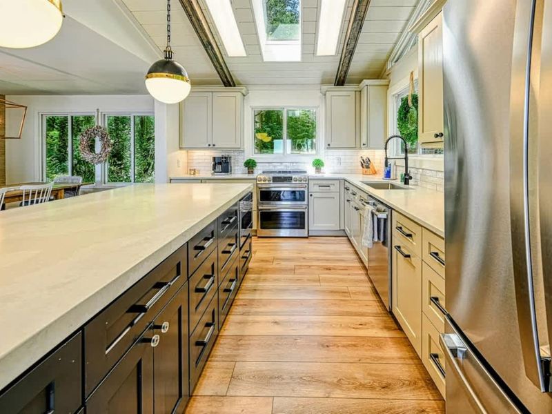 Bright Kitchen Space: A bright and open area for cooking, featuring a Lake Anna backdrop.