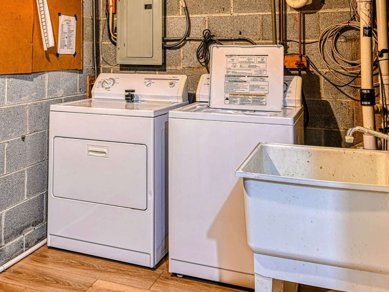 Laundry Room: A convenient space with modern laundry amenities during your Lake Anna retreat.