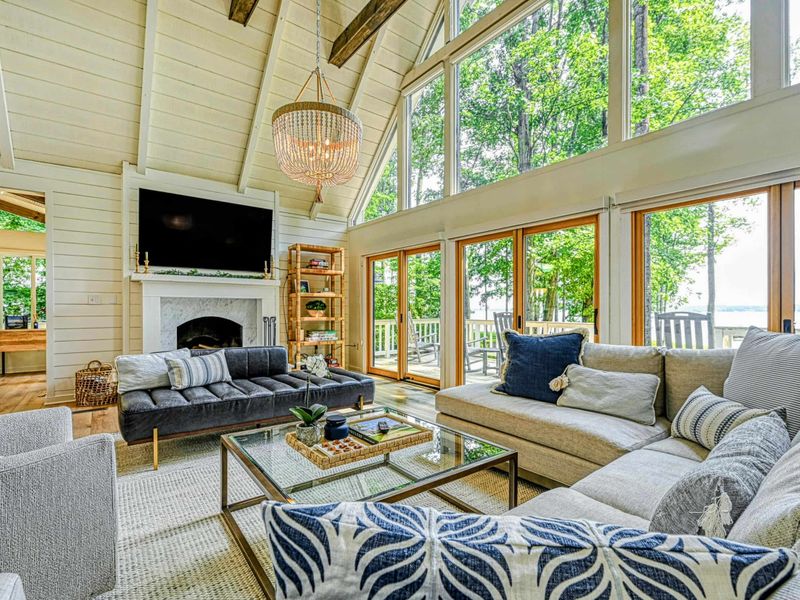 Living Room Details: A close-up showcasing elegant décor and natural light with Lake Anna nearby.
