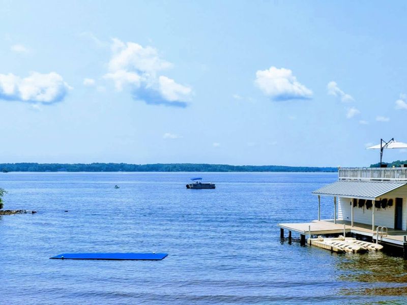 Lake Anna Fun: Take in expansive water views, swim right from your private shoreline, and watch boats pass by for a perfect day on the lake.