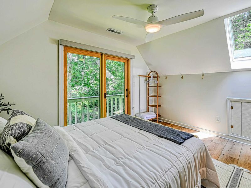 Loft Bedroom Suite: A bright loft bedroom with attached bathroom, ample natural light and a private balcony.
