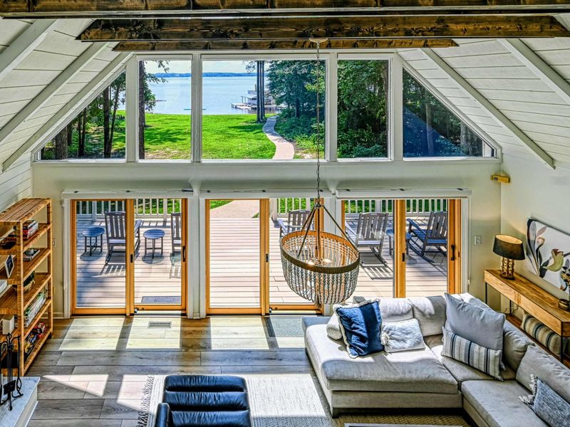 Loft View of Great Room: Bright and open, ideal for gatherings with Lake Anna as the perfect backdrop.
