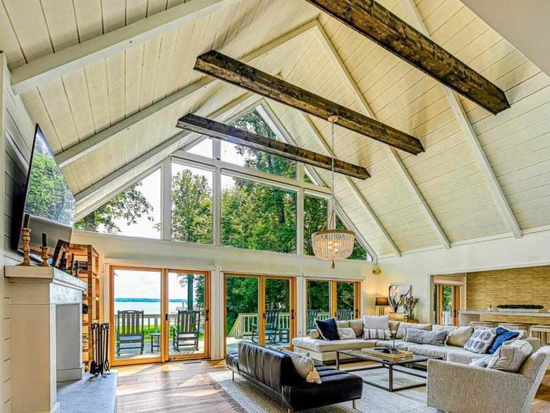 Lakefront Living: The perfect mix of indoor comfort and breathtaking Lake Anna beauty.