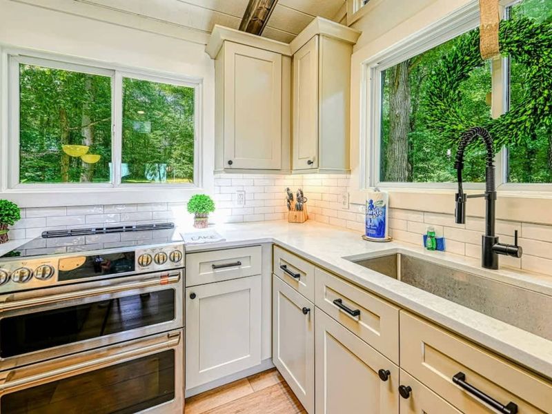 New Kitchen: A luxurious, modern kitchen with views connecting to Lake Anna.