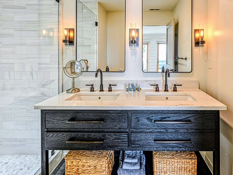 Attached Lakeview Bathroom: Modern fixtures in a private bathroom near the Lake Anna retreat.