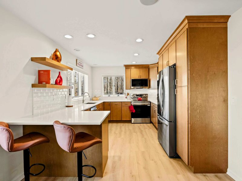 Chef’s Kitchen – Sleek appliances and ample space for cooking up a feast.