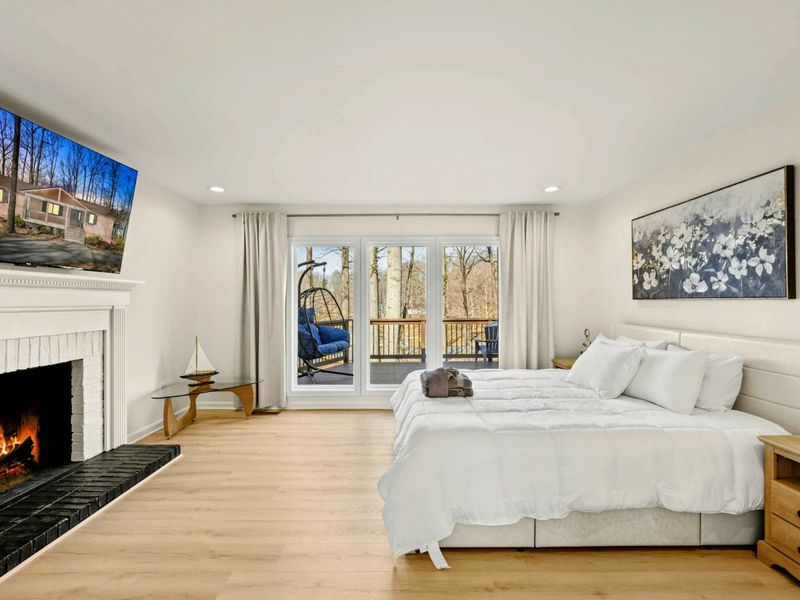 Cozy & Elegant – A tranquil bedroom with soft linens and warm lighting.