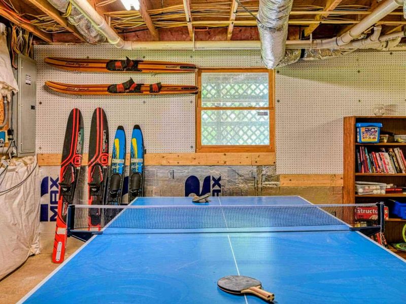 Challenge your family and friends to a fun game of ping pong in our game room, perfect for indoor entertainment.