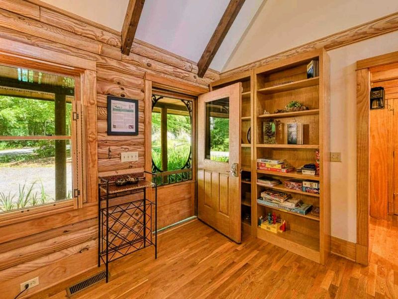 Step inside and enjoy a cozy atmosphere filled with books and games for all ages, perfect for a relaxing retreat.