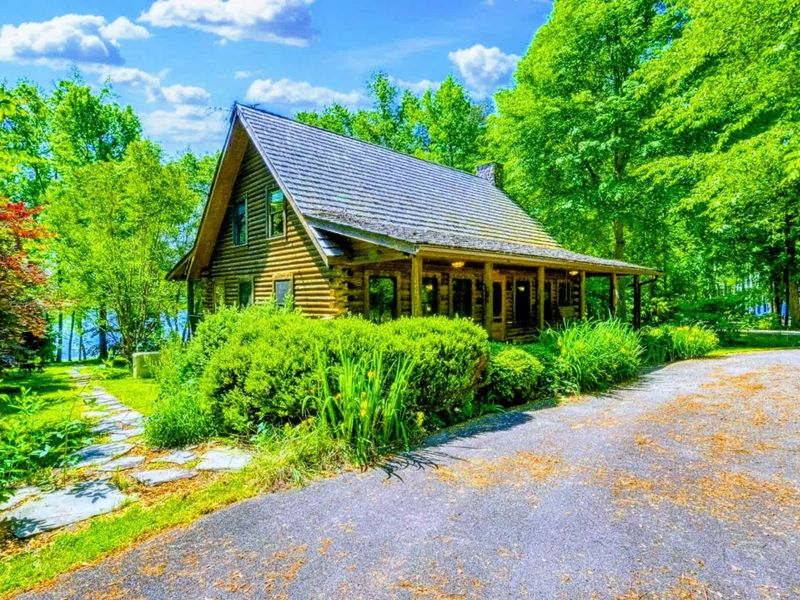 Escape to this charming lakefront cabin surrounded by nature, offering the perfect blend of tranquility and comfort.