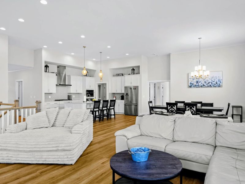 Great Room - From the lounger you can see straight to the kitchen island and dining table, all under one vaulted ceiling.