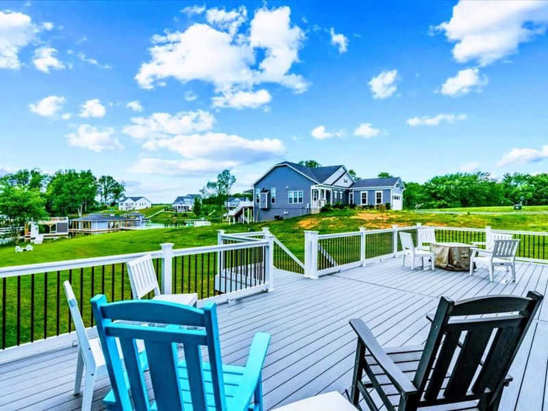 Outdoor Deck - Peaceful mornings and easy sunset evenings on a spacious deck that overlooks the yard and water beyond.