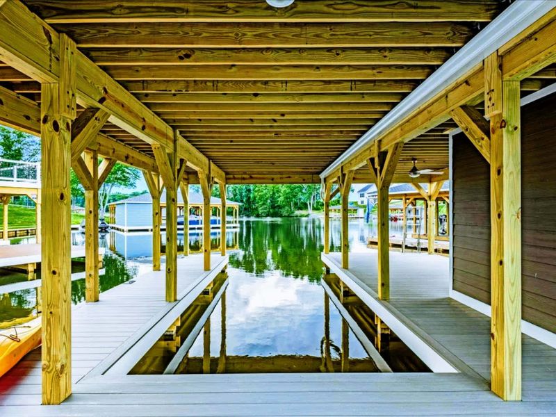 Covered Dock - A shaded slip for the boat with plenty of room to fish, lounge, or watch the sun cross the cove.