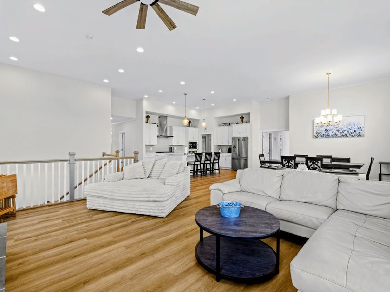 Great Room - Sectional and lounger flow straight into kitchen and dining, so the gathering never gets split between rooms.