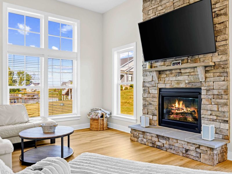 Great Room - Fire lit, tall windows, soft seating: the room where the day winds down and the conversation runs long.
