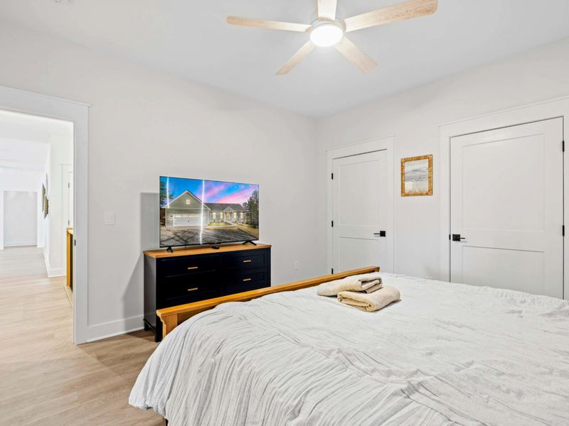 Bedroom 3 - A woven king bed and a Smart TV make this main-level room a comfortable retreat, with a Jack-and-Jill bath next door.
