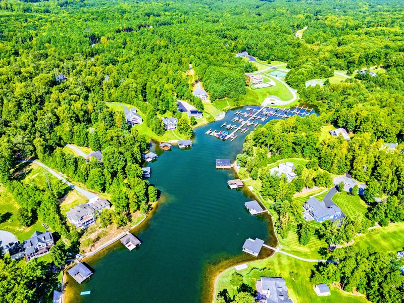 The Waters Community - A forested, water-woven neighborhood of docks, coves, and quiet streets on Lake Anna's exclusive private side.