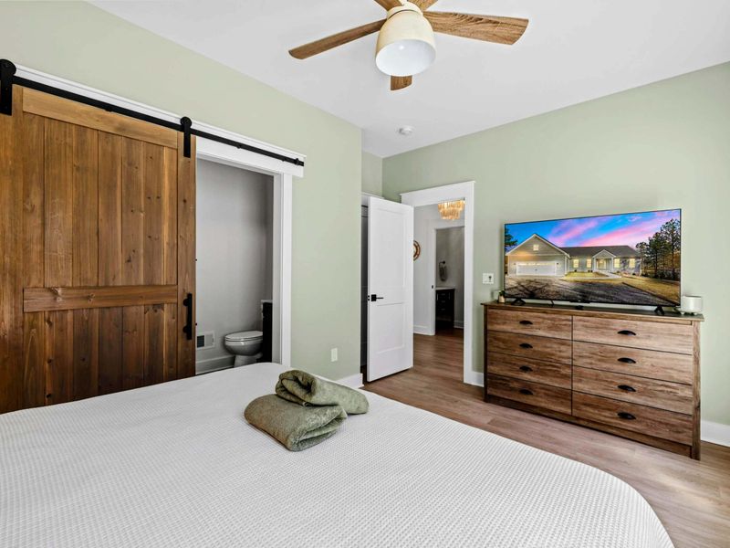 King Suite - Bright and restful with a king bed, Smart TV, and a private ensuite bath, right off the main-level hall.