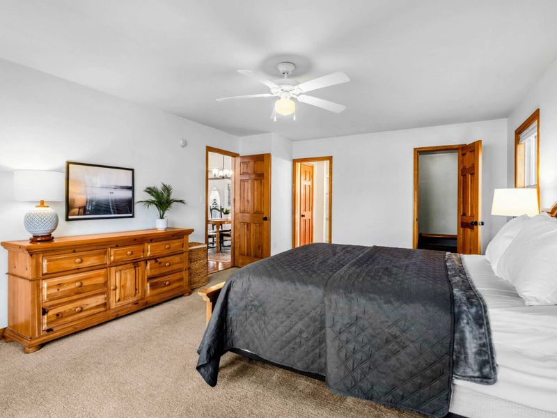 Well-Appointed Bedroom – This primary suite includes plenty of storage, stylish furnishings, and homey touches to make you feel completely at ease during your stay.