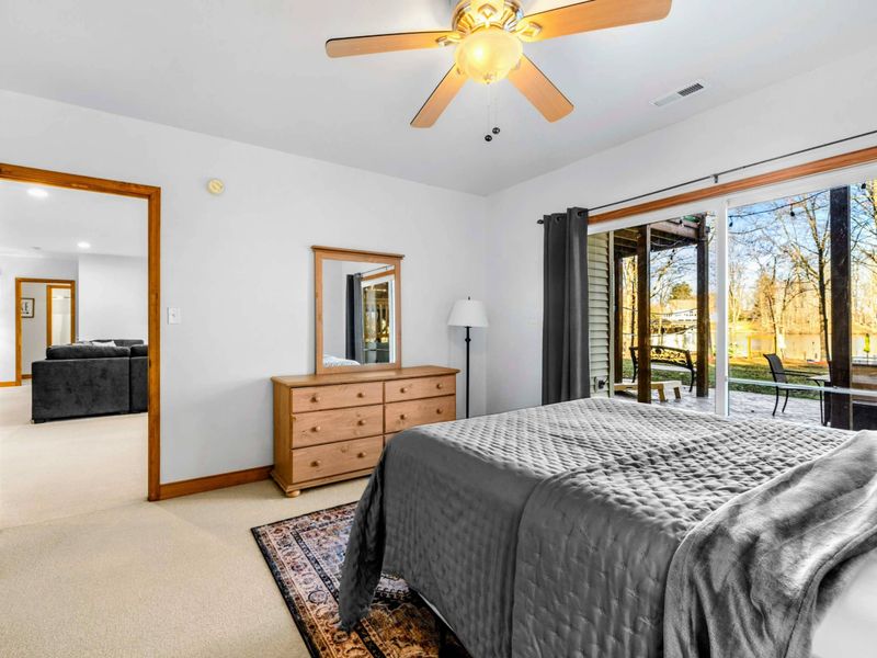 Serene and Spacious – With ample closet storage and natural light streaming in, this bedroom combines functionality and tranquility for a comfortable stay.