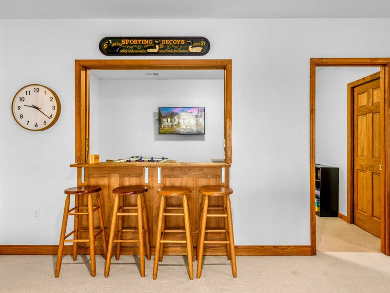 Game Room Bar – Add a little extra fun with this charming built-in bar, complete with four barstools and a cozy counter for drinks and snacks. It’s the perfect spot to kick back and enjoy time together between rounds of pool or ping pong.