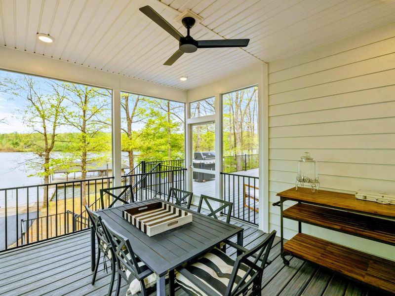 Where Meals Turn Into Moments – With space for everyone and views all around, this porch invites you to linger a little longer.