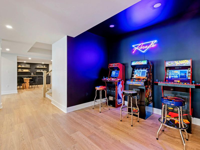 Old School Cool – Neon-lit and nostalgia-packed, the arcade offers throwback fun just steps from the grown-up bar and lounge.
