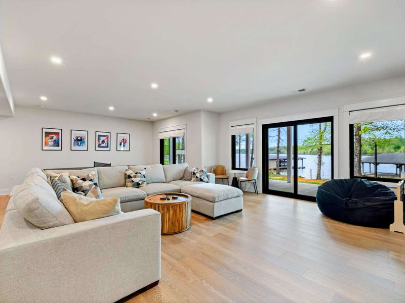 Fun Starts Here – Ping pong, bean bags, and a sectional that seats everyone—this space turns downtime into playtime.