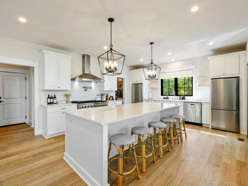 Crafted for Gathering – With space to prep, sip, or simply keep the cook company, this kitchen makes hosting effortless.