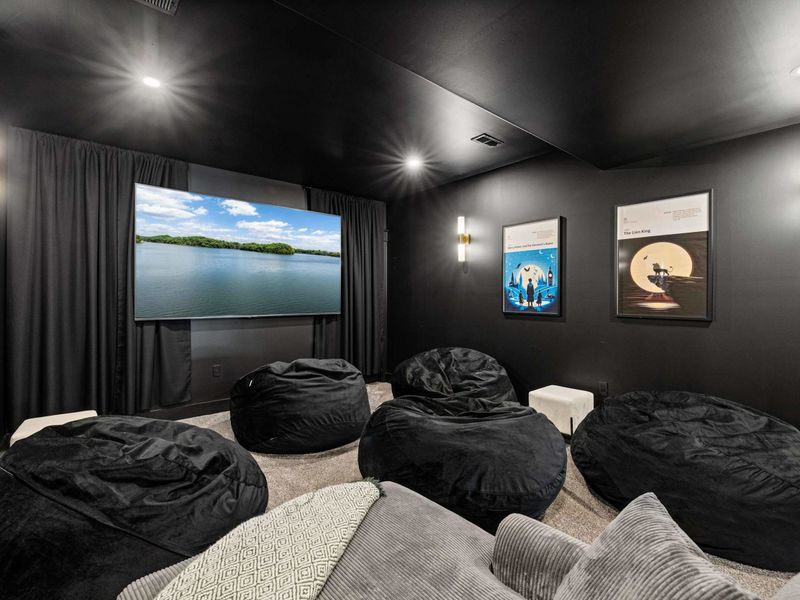 Private Screening Room – Deep cushions, a glowing screen, and no crowds—movie night is yours to command.